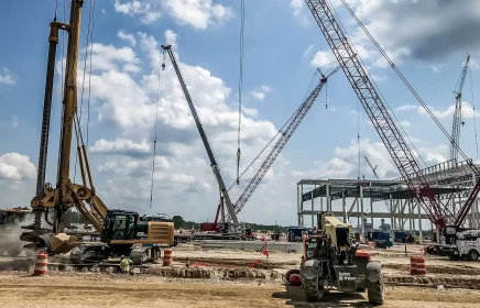 Foundations crew installing drilled caissons to support new battery cell manufacturing plant
