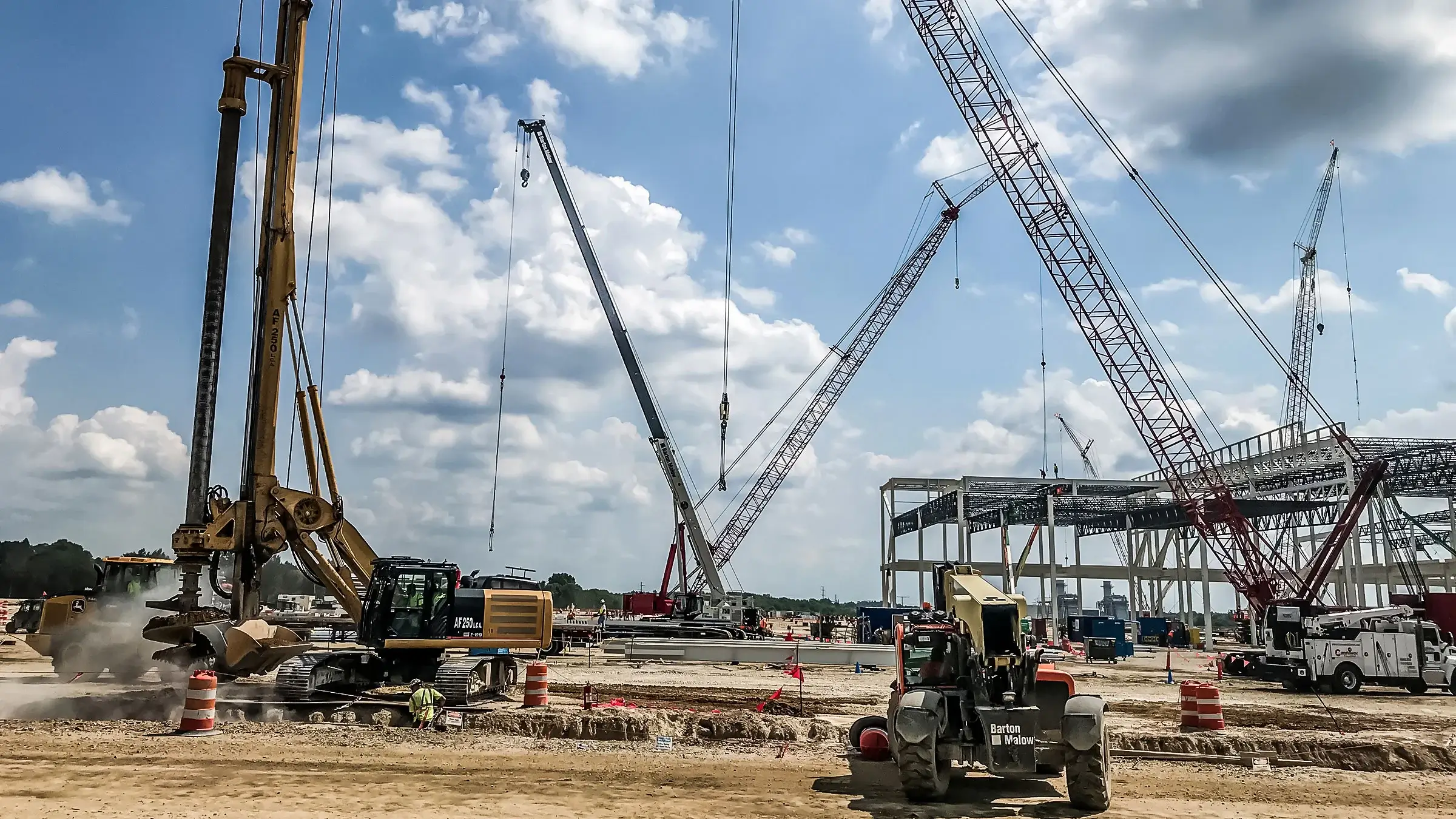 Foundations crew installing drilled caissons to support new battery cell manufacturing plant