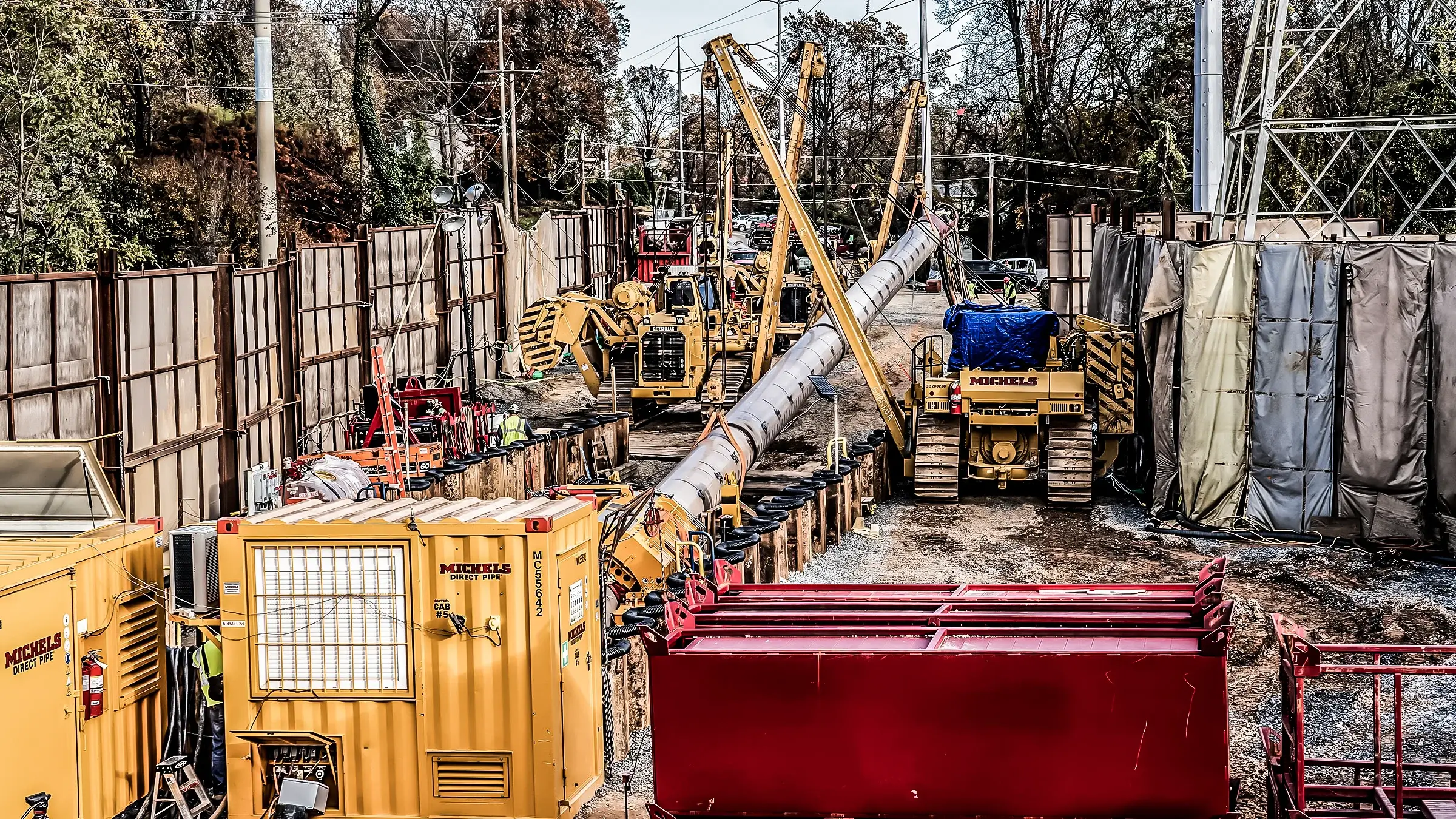 Pipelayers assist in the operation of a Direct Pipe rig