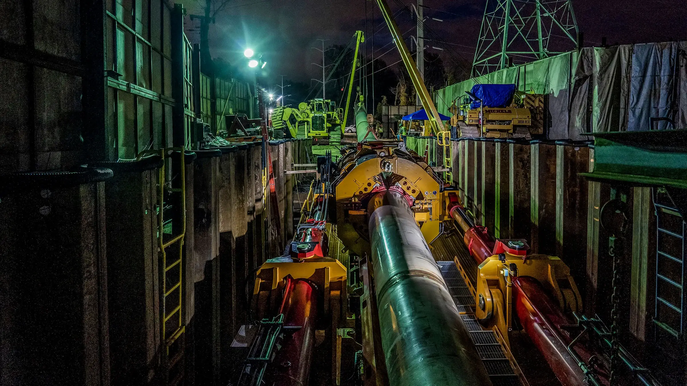 Direct pipe preparing for installation during nightfall