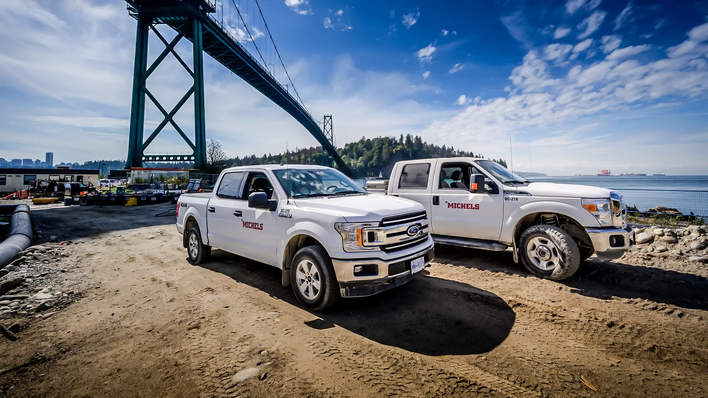 Two pickup trucks on north shore