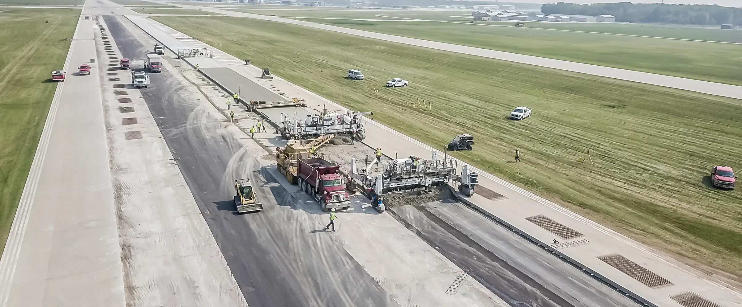 A paving crew operates at the Green Bay Airport.